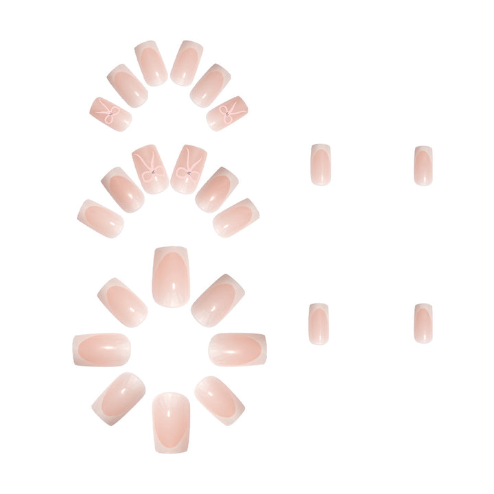 Nail art set with elegant bow and glitter accents Kalsten