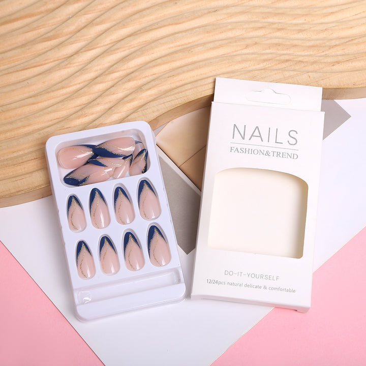 Artistic Nail Design with Elegant Golden Accents Kalsten