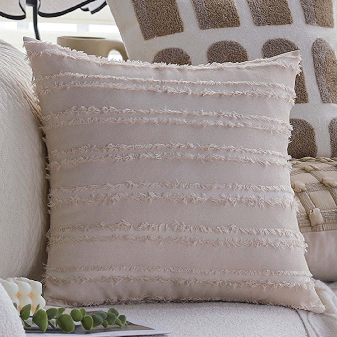 Square decorative pillow cover with tufted grid relief and tassel appliqués Kalsten