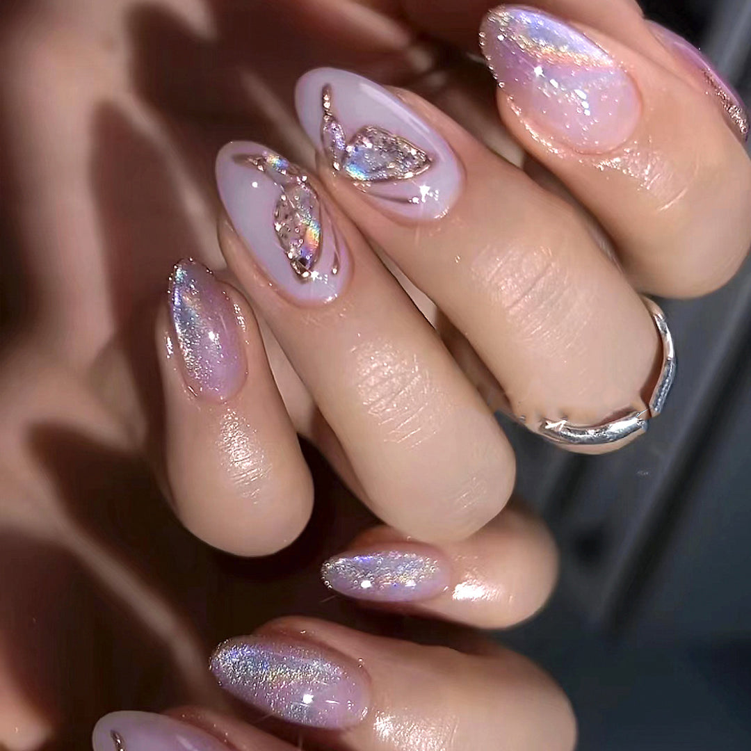 Glamorous artificial nails with rhinestone and glitter decorations Kalsten