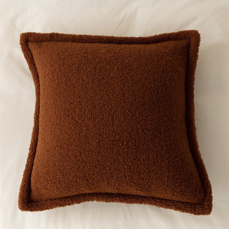 Decorative teddy fleece cushion with padded filling and piped seam