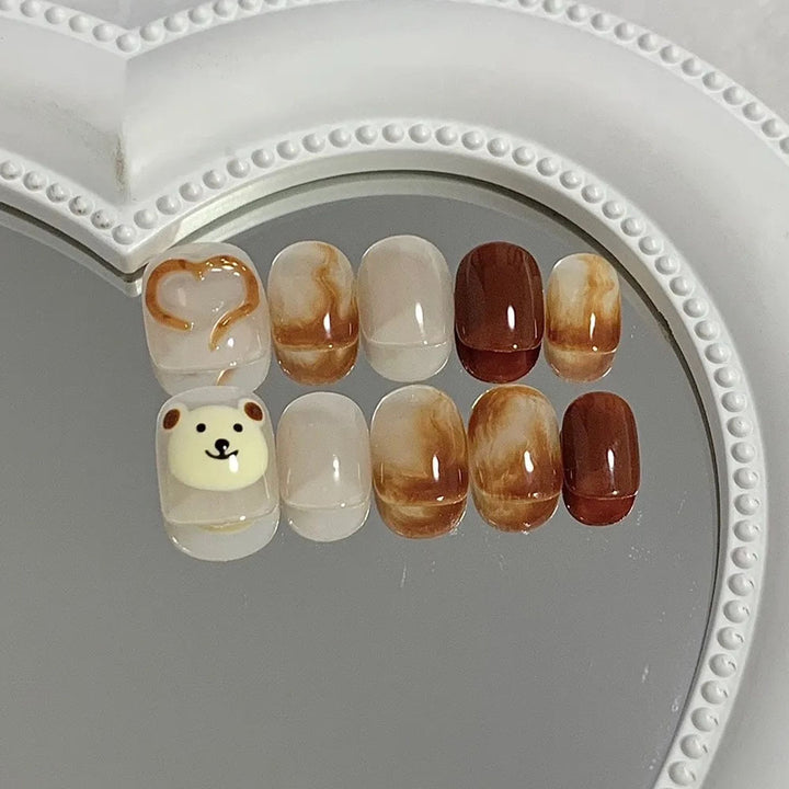 Artificial nails with cute bear design and marbled pattern Kalsten