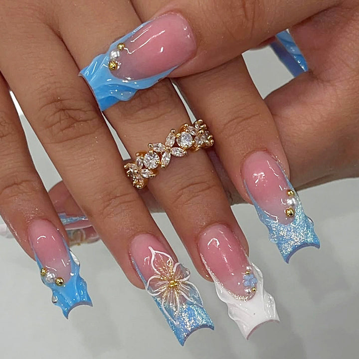 Artistic Nail Art Set with Floral and Glossy Accents kalsten