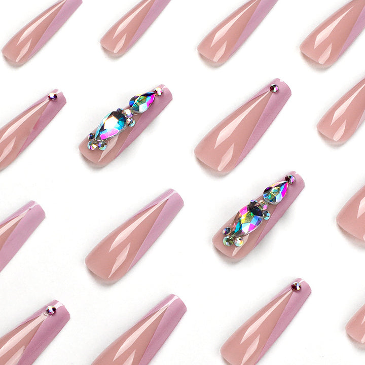 Artful nail extensions with rhinestone and flower accents Kalsten