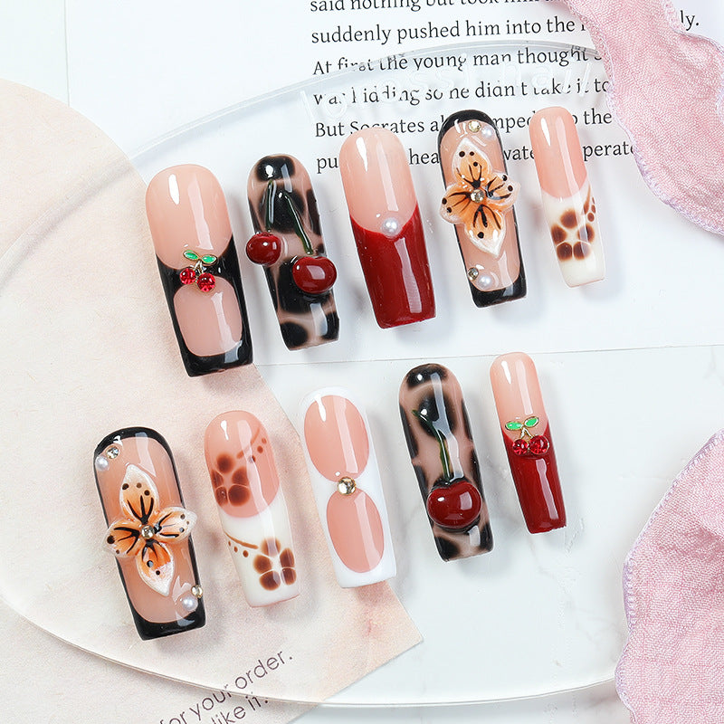 Creative nail art set with floral and fruity accents Kalsten