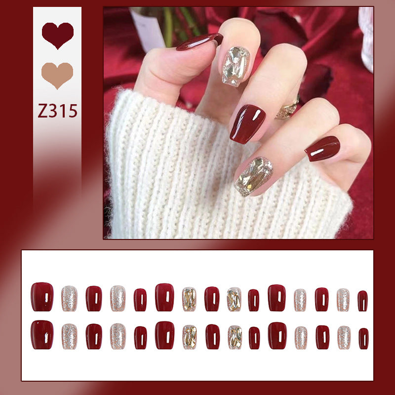 Artificial nail set with elegant glitter and metallic accents Kalsten