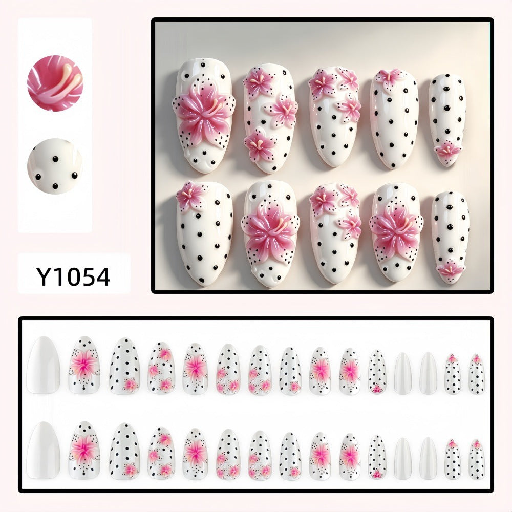 Artificial nail set with floral accents and polka dots Kalsten