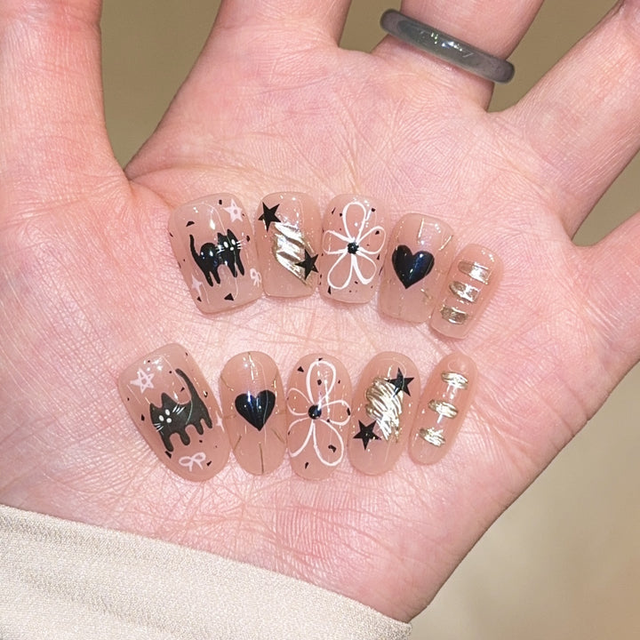 Artificial nails with unique cat and star design Kalsten