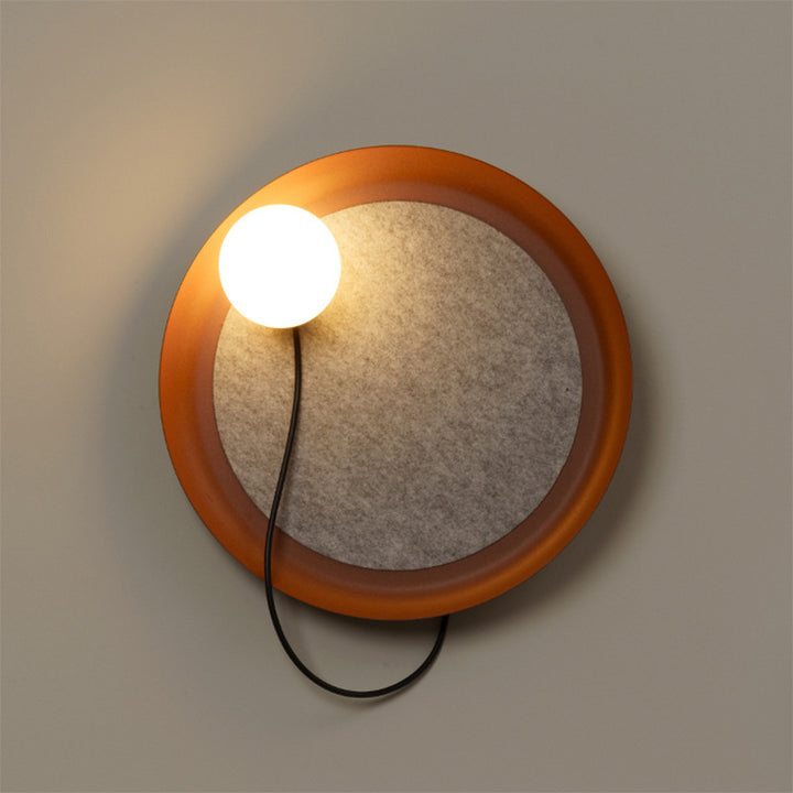 Modern Wall Sconce with Fabric Backdrop and Soft Glow
