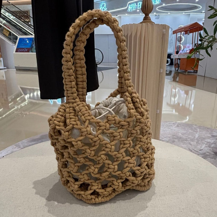 Fashionable handbag made of braided material Kalsten