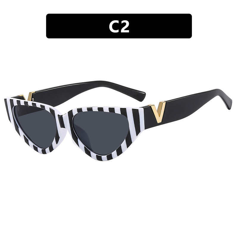 Women's Cat-Eye Sunglasses with modern stripe pattern and elegant accent Kalsten
