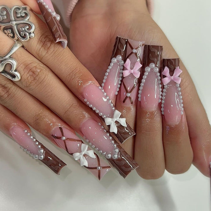 Artificial nail set with stylish 3D bow details and elegant shine Kalsten