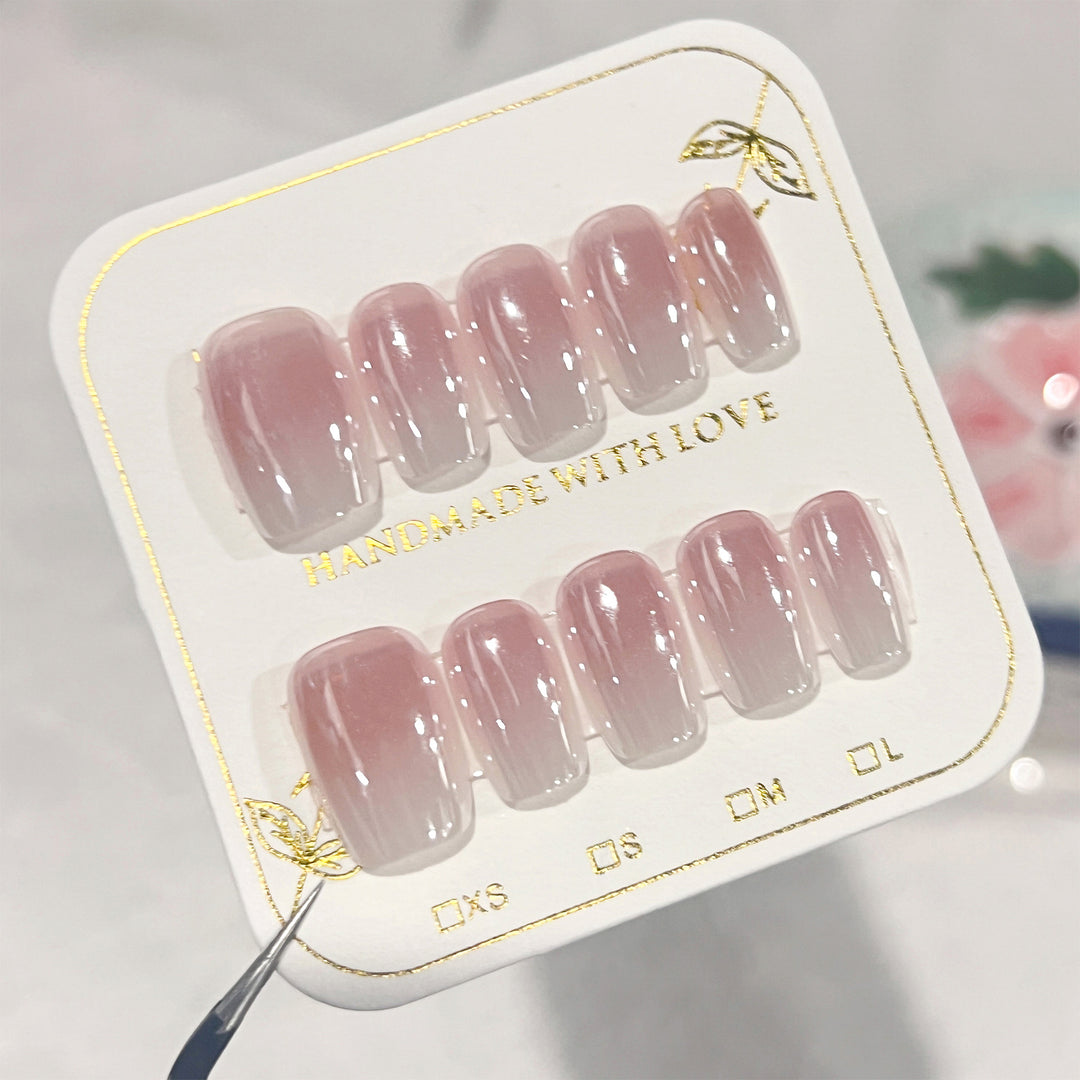 Artificial nail extensions in elegant ombre design Kalsten
