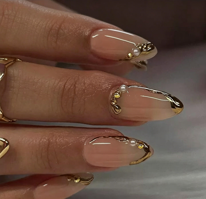 Elegant Gold-Decorated Acrylic Nail Art Enhancements Kalsten
