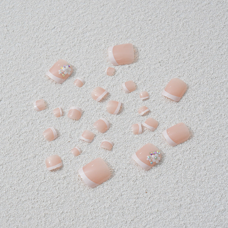 Artificial nail set with elegant French tip design and sparkling accents Kalsten