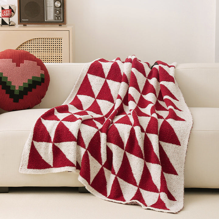 Coarsely woven decorative blanket with geometric jacquard pattern and soft bouclé Kalsten
