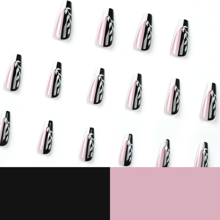Artful nail extensions in elegant black and white design Kalsten