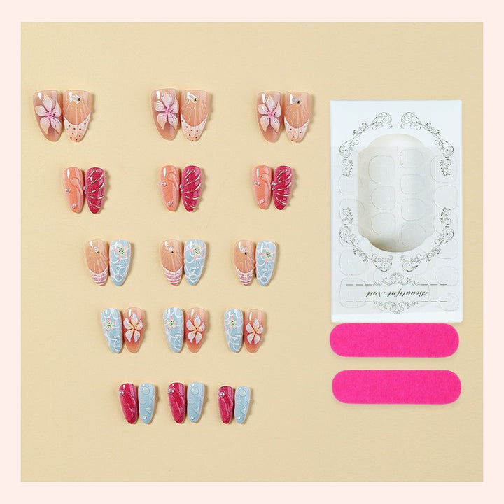 Artificial nail set with floral 3D design and glitter accents Kalsten