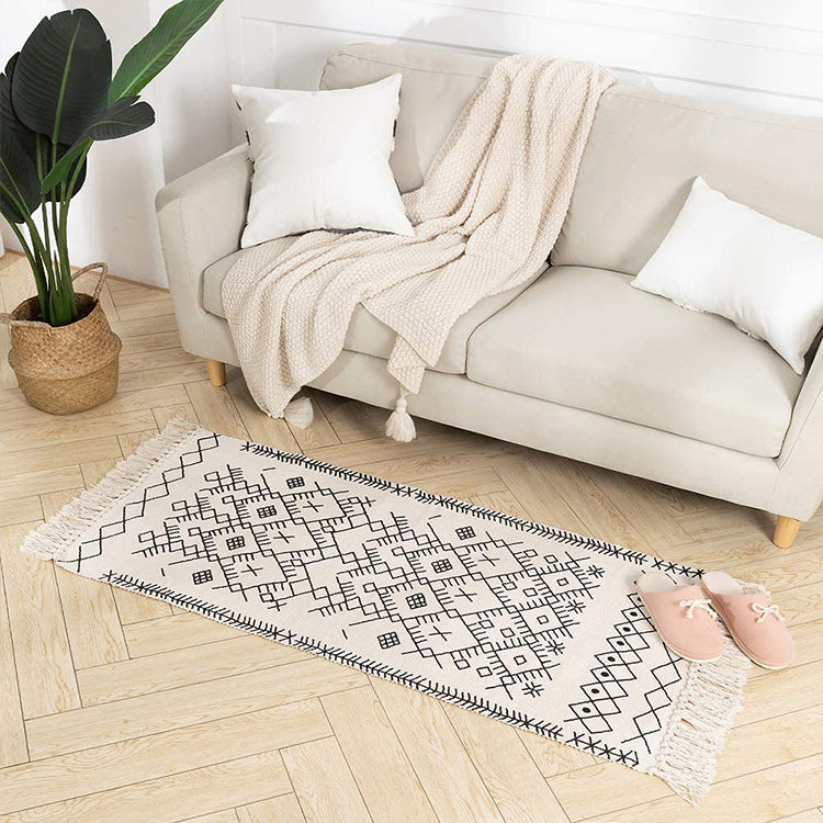 Flat-woven entrance and living room rug with Moroccan diamond jacquard and decorative fringes Kalsten
