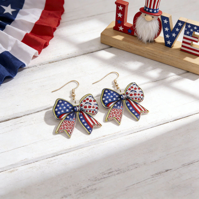 Women's acrylic statement earrings long pendant bow motif with patriotic print Kalsten