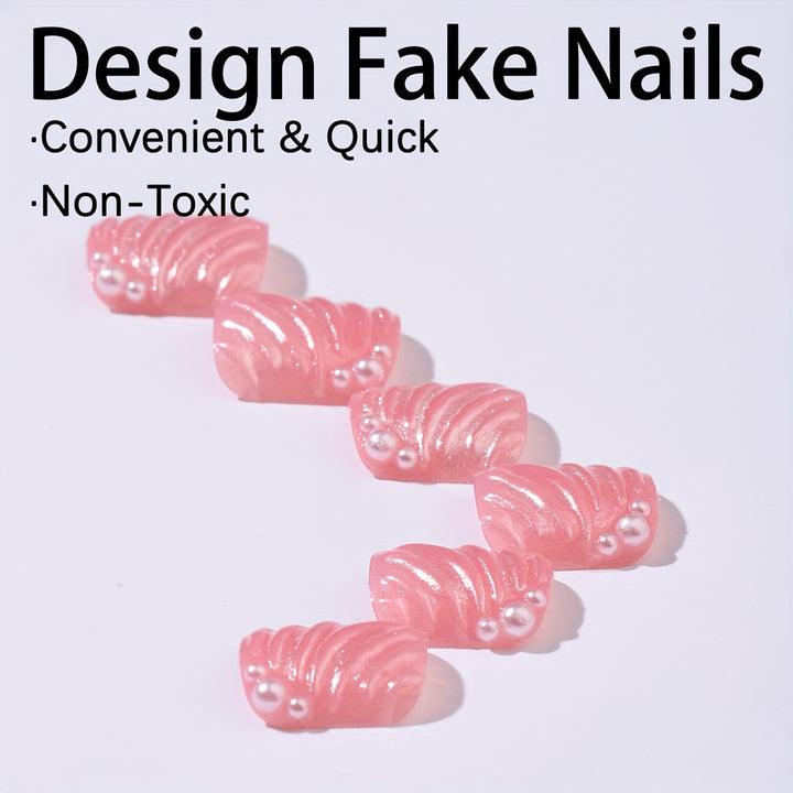 Nail art set with elegant shell designs and glitter accents Kalsten