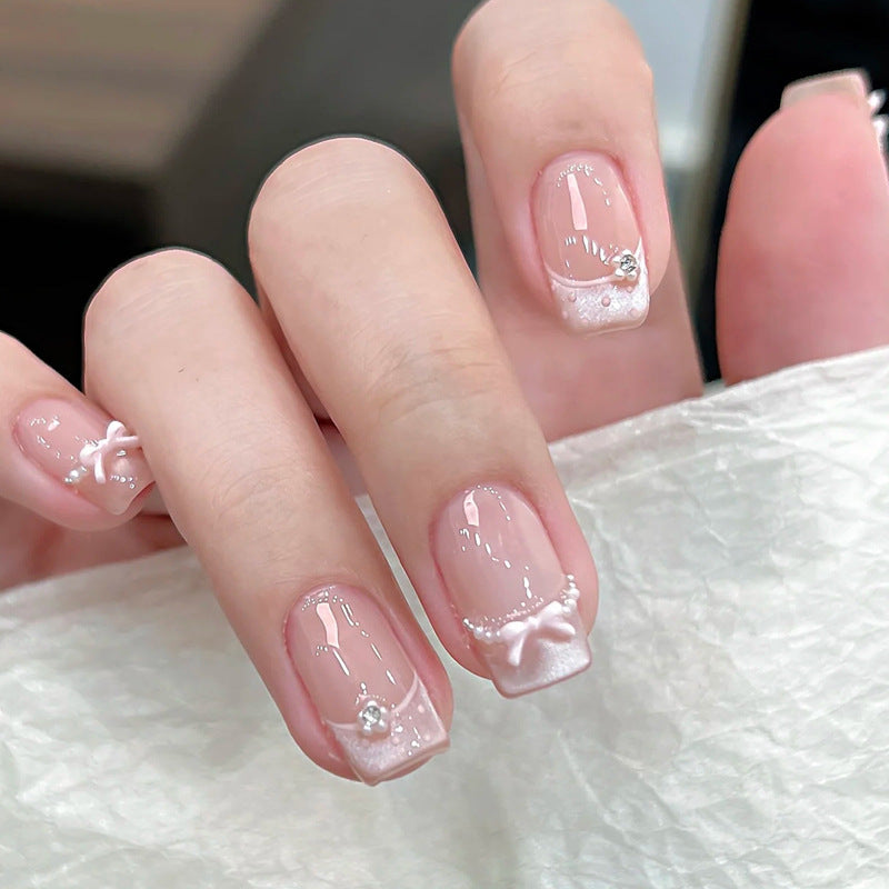 Elegant French Tip Press-On Nail Art with Bow Accents Kalsten