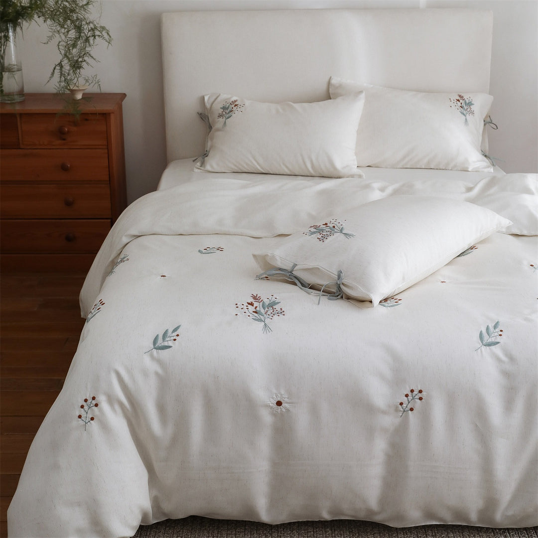 Embroidered cotton bedding set with bow pillowcases and dried flower embroidery