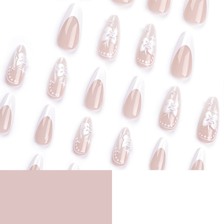 Artful stiletto nails with floral designs and glitter accents Kalsten