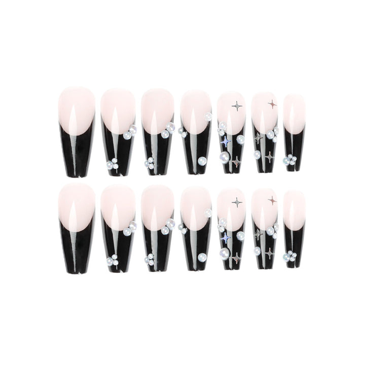 Artificial nail art with pearl and shine elements Kalsten