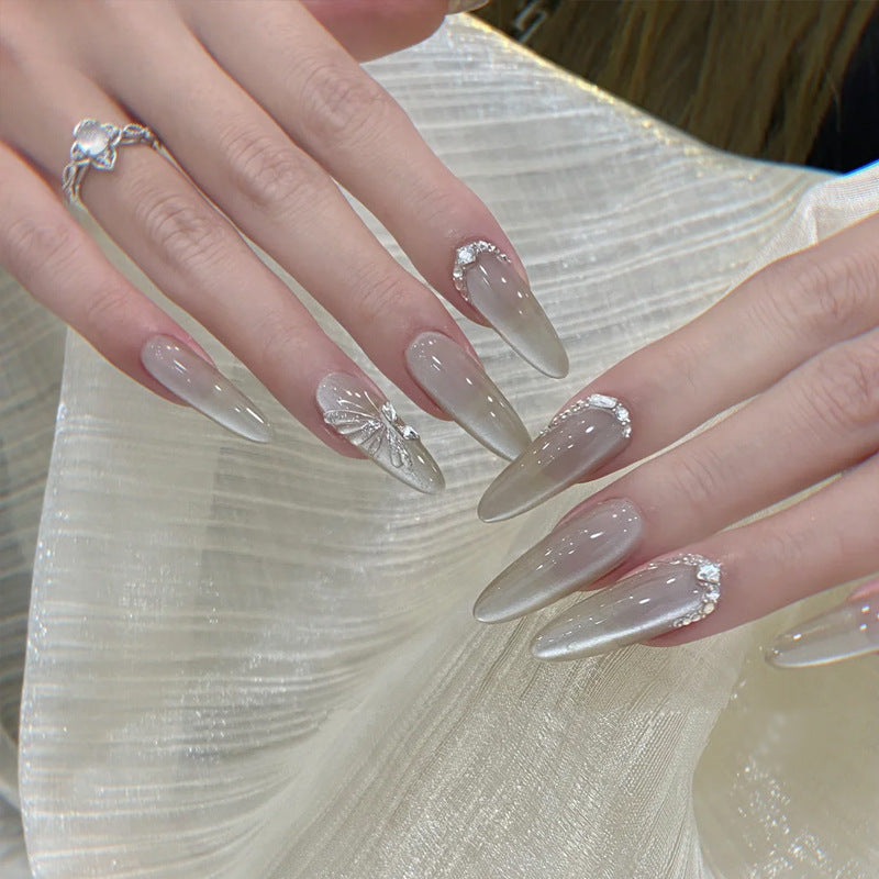 Elegant Stiletto Press-On Nail Extensions with Floral and Rhinestone Accents Kalsten