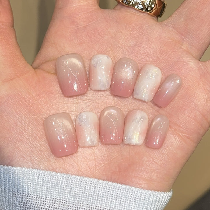 Artificial nails with elegant gradient colors and holographic accents Kalsten