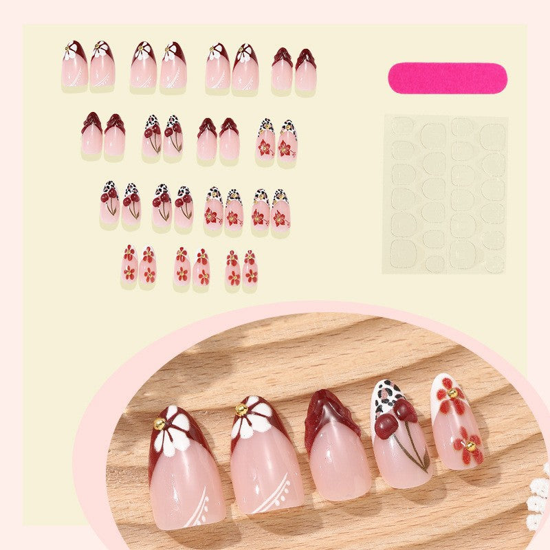 Elegant artificial nails with floral accents and glitter Kalsten