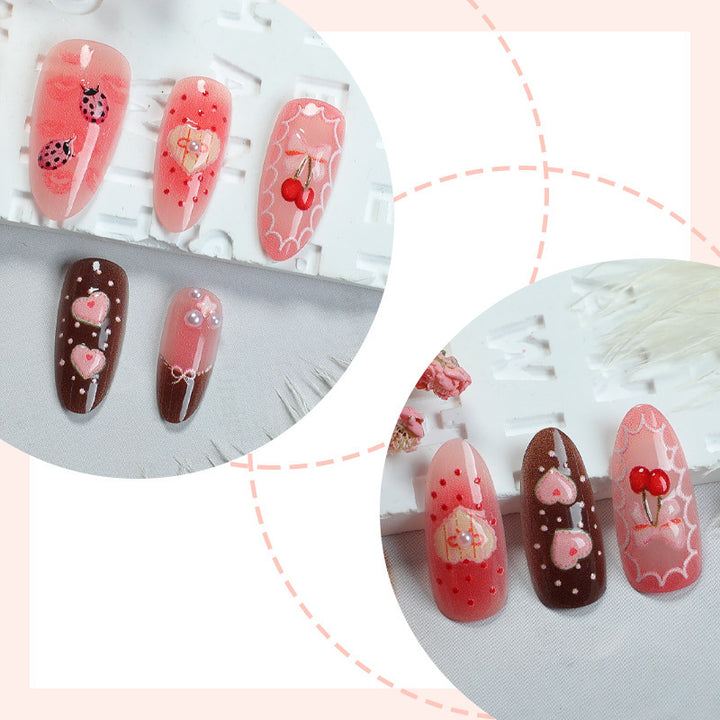 Artificial nail set with floral and playful tea motifs Kalsten