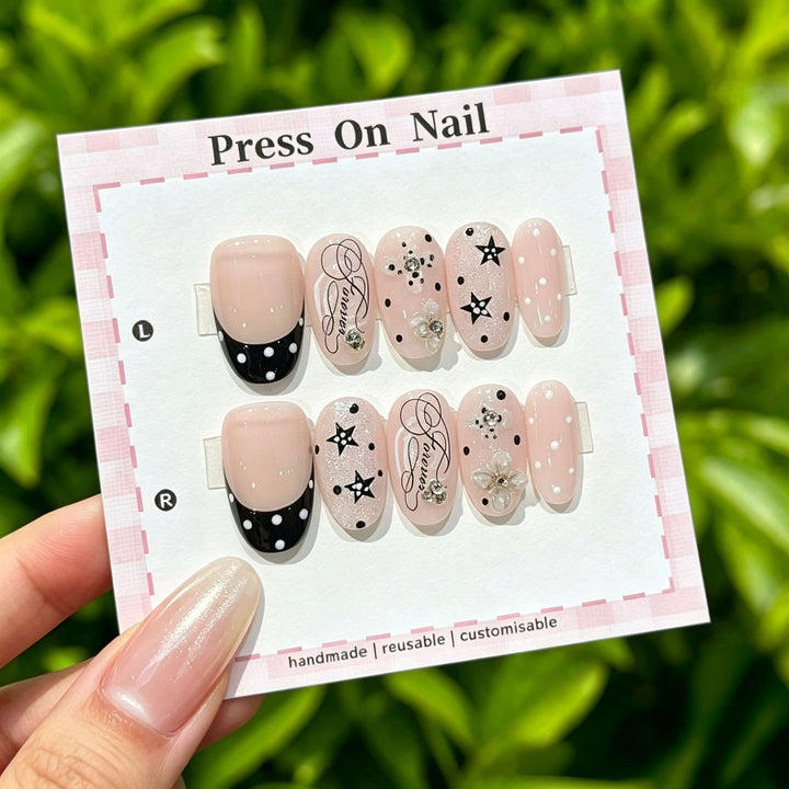 Artistic Press-On Nail Set with Star and Floral Accents