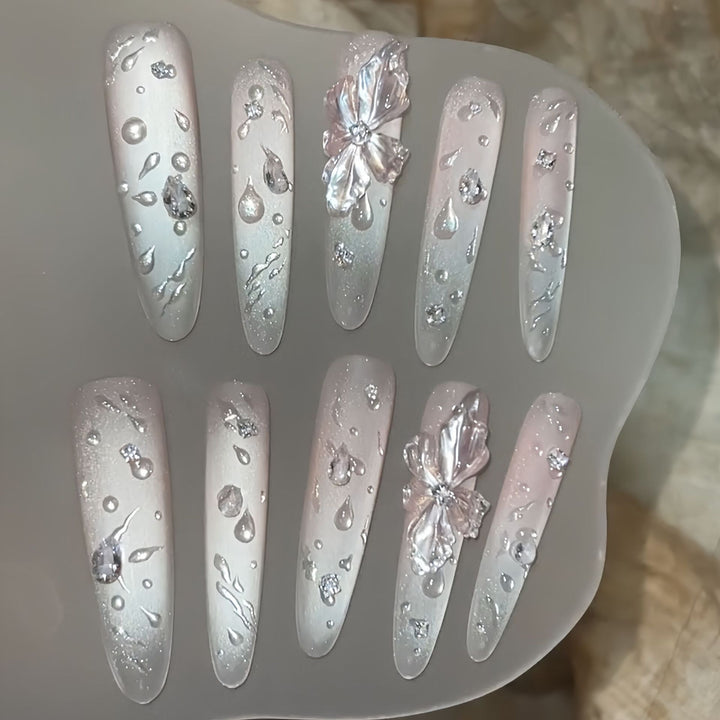 Glamorous artificial nails with sparkling accents Kalsten