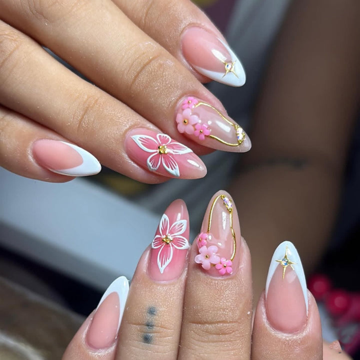Artful acrylic nails with elegant floral accents Kalsten