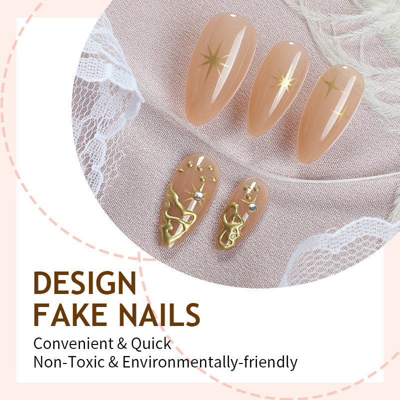 Creative nail set with elegant gold embellishments and sparkling accents Kalsten