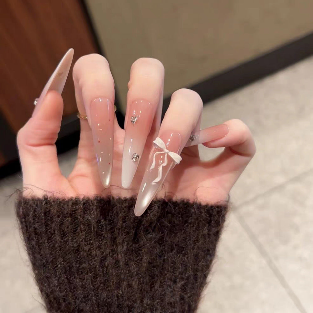 Decorative Press-On Nail Extensions with Bow and Rhinestone Accents Kalsten