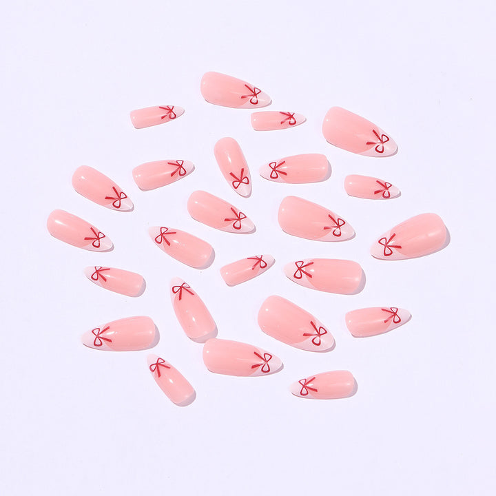 Artificial nail set with playful bow design Kalsten