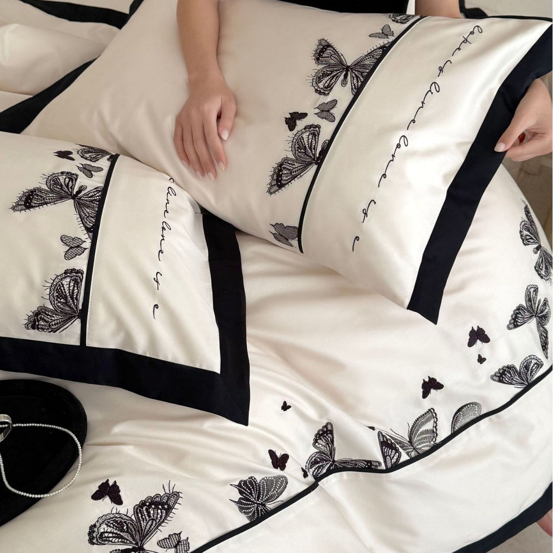 Luxurious cotton satin bedding set with butterfly embroidery and contrasting piping Kalsten