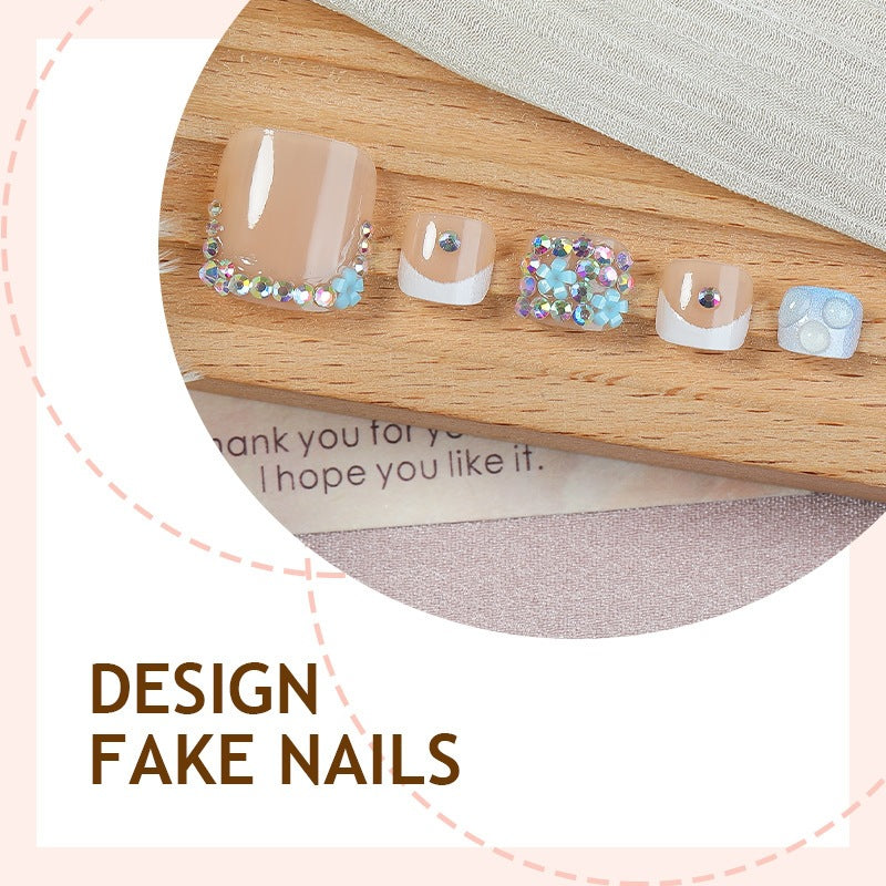 Glamorous artificial nail creation with elegant embellishments Kalsten