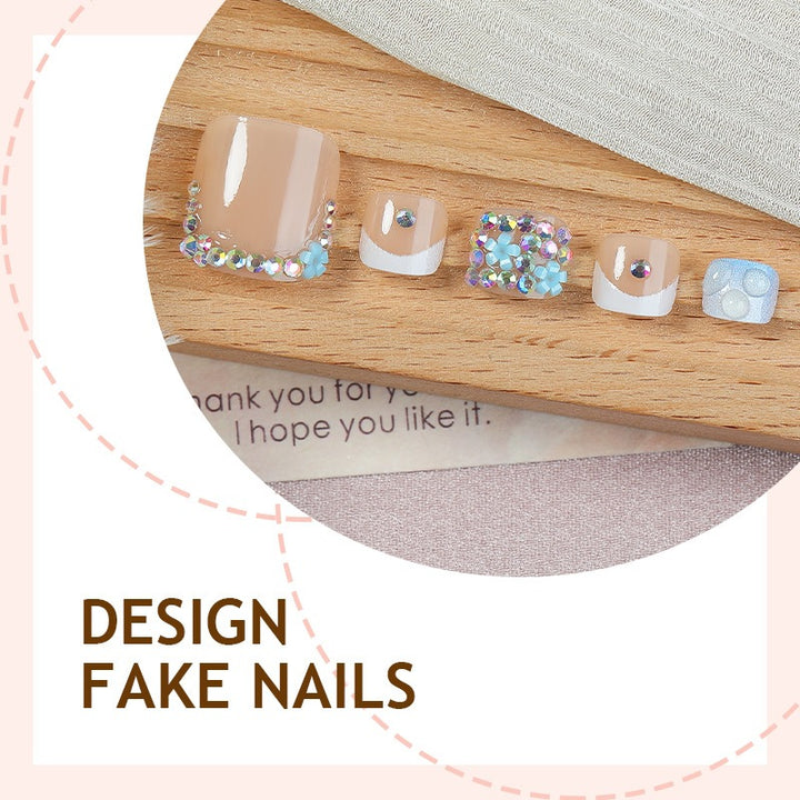 Glamorous artificial nail creation with elegant embellishments Kalsten