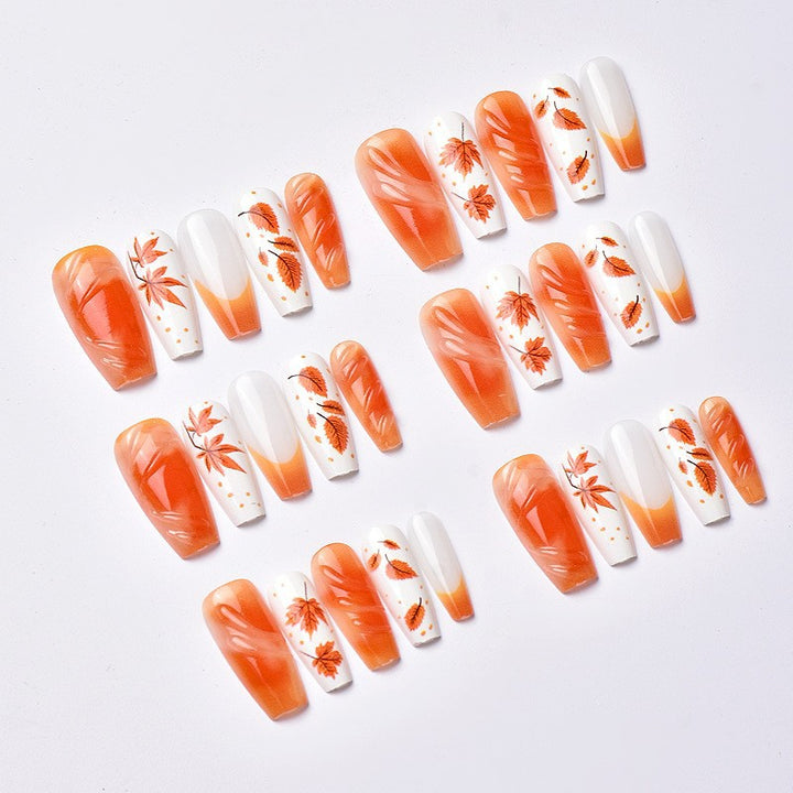Acrylic nail set with elegant autumn motifs and shiny accents Kalsten