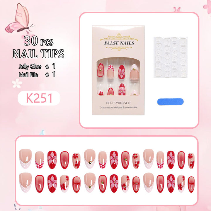 Artificial nails with floral design and glamorous accents Kalsten