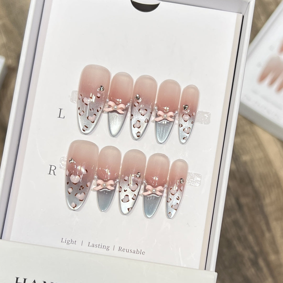 Decorative Press-On Nail Design with Bow Accents Kalsten