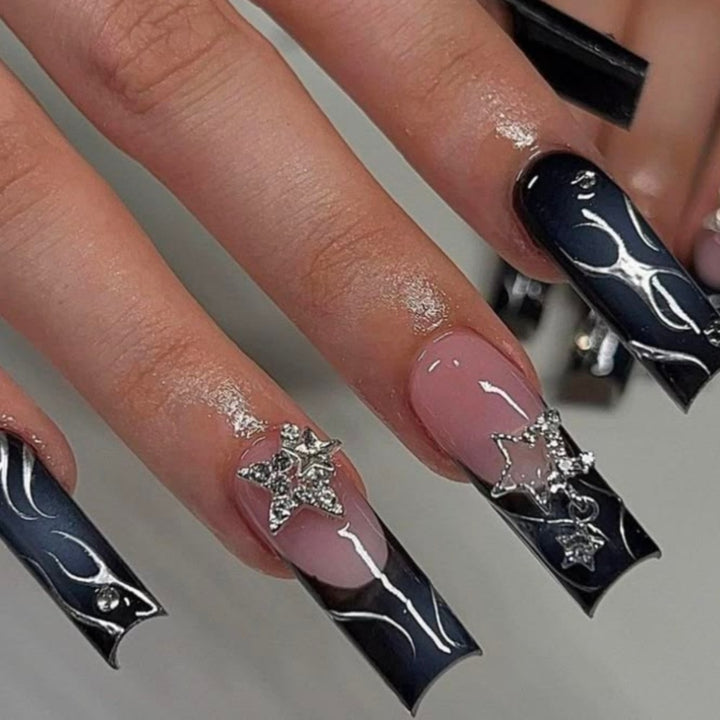 Artificial nails with elegant glitter accents and heart motifs Kalsten