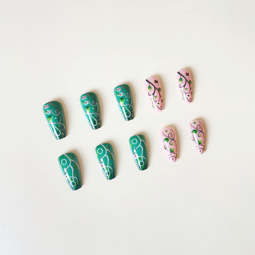luxurious artificial nail set with floral designs and detailed accents Kalsten