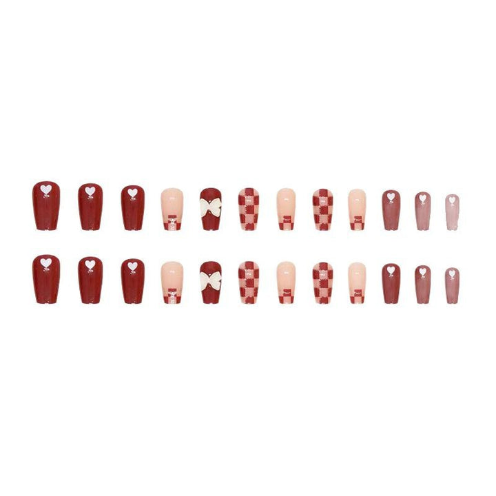 Artificial nails with decorative heart and bow details Kalsten