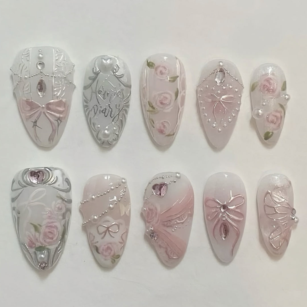 Artistic nail extensions with elegant flower decoration Kalsten