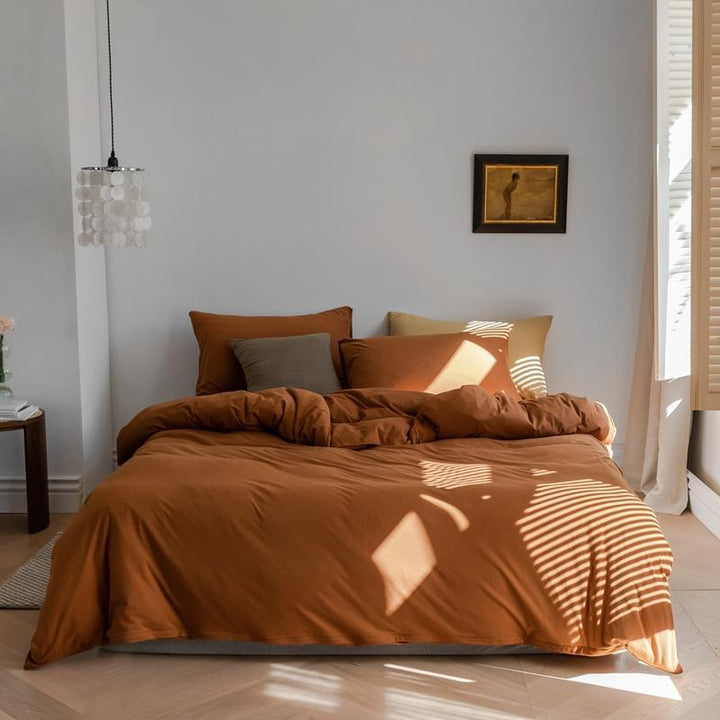 Minimalistic duvet cover set made of skin-friendly cotton blend with soft fiber filling